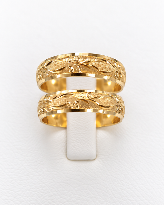 Argolla de matrimonio semi coca grabada en oro amarillo 18K